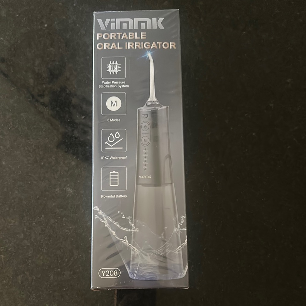 Vinnk Portable Oral Irrigator - Black. Brand New, in box!